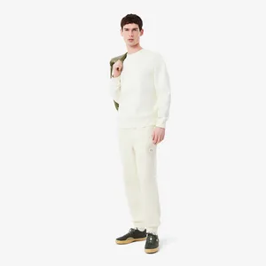 Мужские спортивные брюки Lacoste из органического хлопка, белый, арт. XH9950