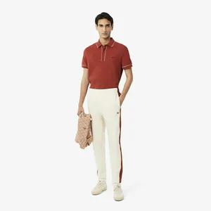 Мужские спортивные брюки Lacoste из хлопка, белый, арт. XH9557