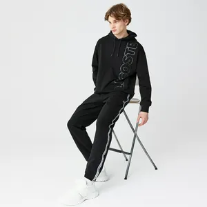Мужские спортивные брюки Lacoste в полоску, черный, арт. XH5072