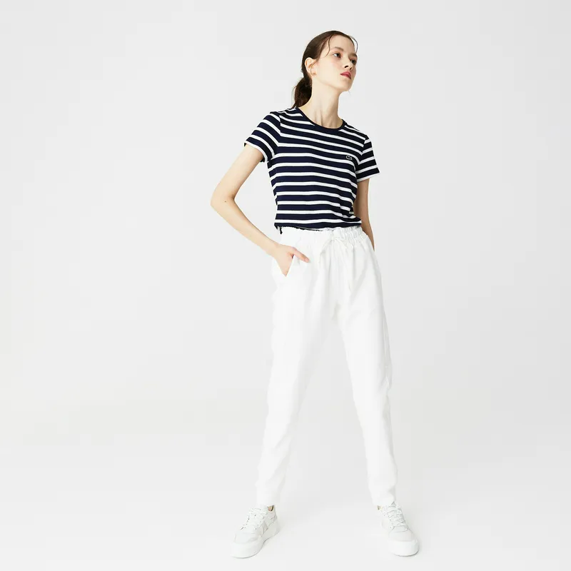 Спортивные брюки Lacoste приталенного кроя, белый, арт. XF0301