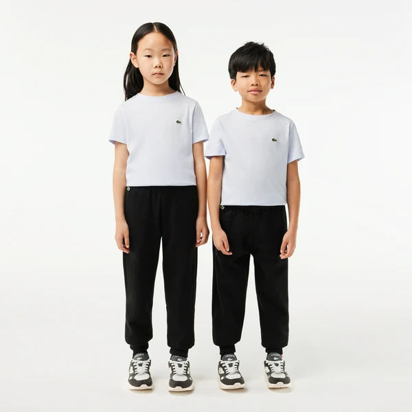 Детские флисовые спортивные брюки Lacoste, черный, арт. XJ9728