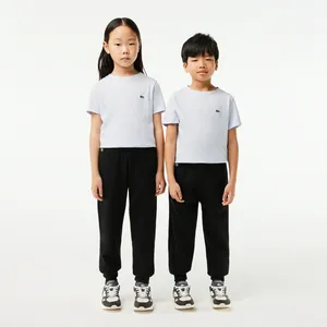 Детские флисовые спортивные брюки Lacoste, черный, арт. XJ9728
