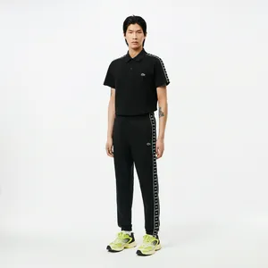 Мужские спортивные брюки Lacoste приталенного кроя, черный, арт. XH7412