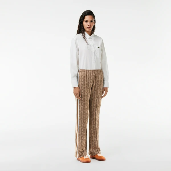 Спортивные брюки Lacoste расклешенные с монограммой, бежевый, арт. XF9313