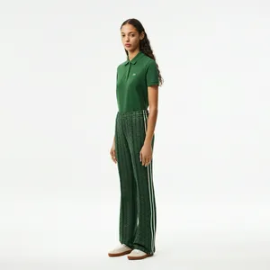 Спортивные брюки Lacoste расклешенные с монограммой, зеленый, арт. XF9313