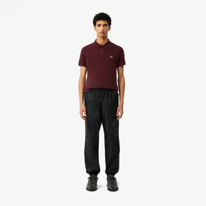 Спортивные брюки Lacoste с орнаментом и эластичным поясом, черный, арт. XH4013