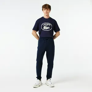 Мужские спортивные брюки Lacoste Slim Fit, синий, арт. XH0323