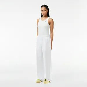 Женские спортивные брюки Lacoste из хлопка, белый, арт. XF7374